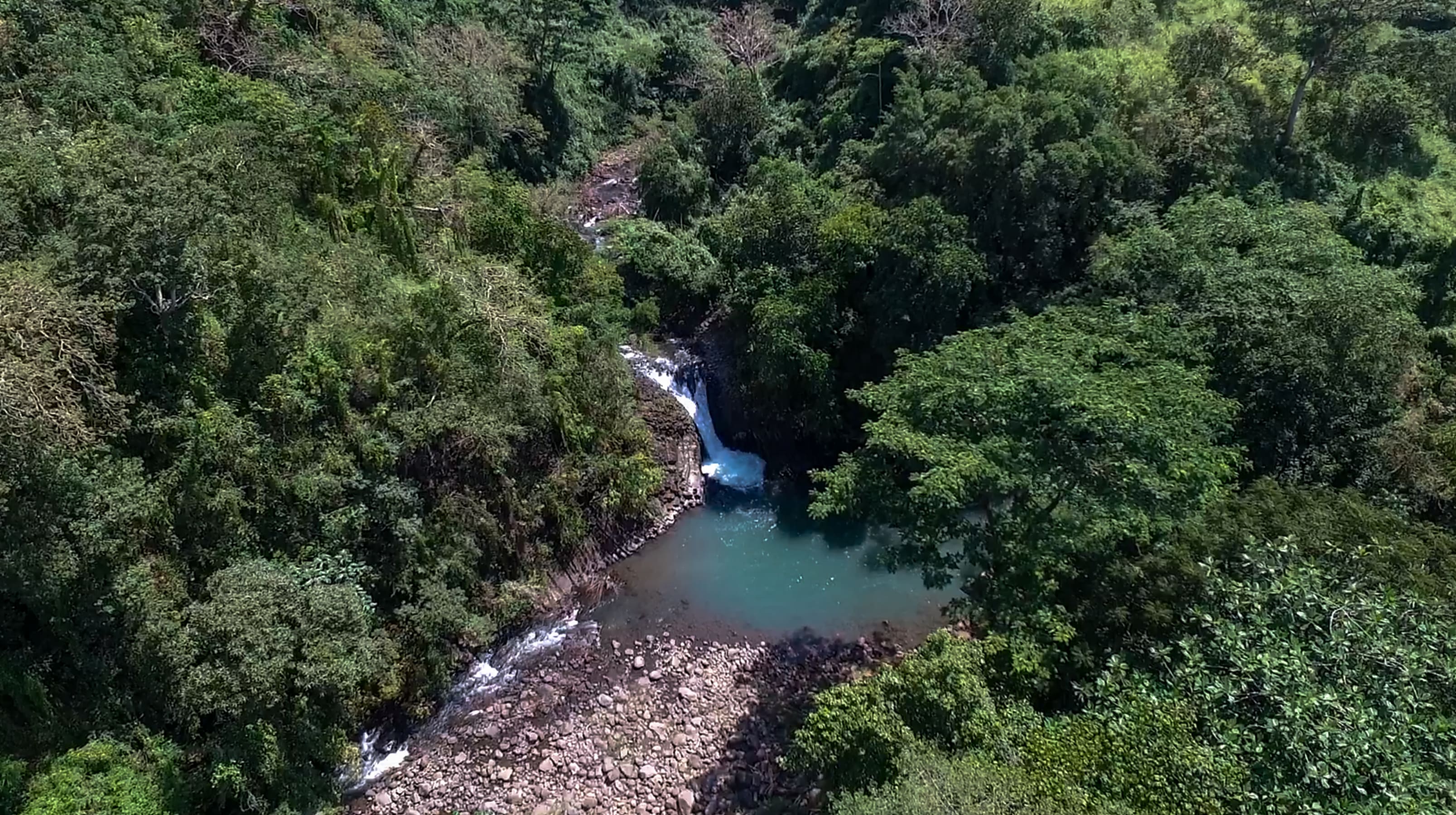 drone image of dunsulan falls in bataan philippines